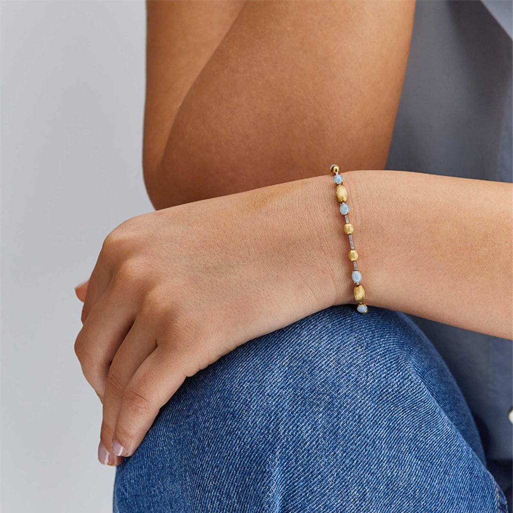 Nanis Dancing Azure Armband (BS1-597) aus Gelbgold mit Aquamarin und Diamant
