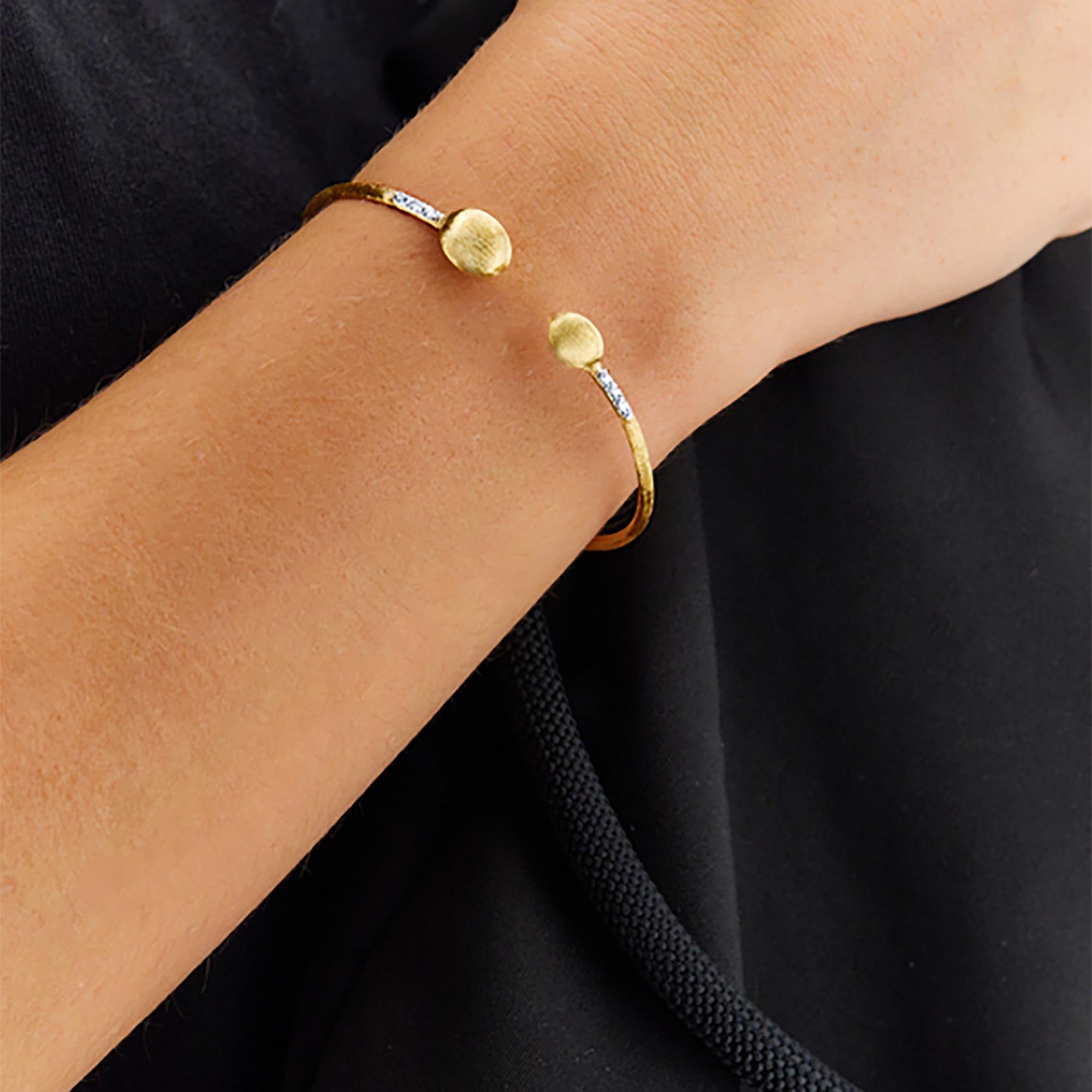 Nanis Dancing Élite Armreif (BS5-583) aus Gelbgold mit Diamant
