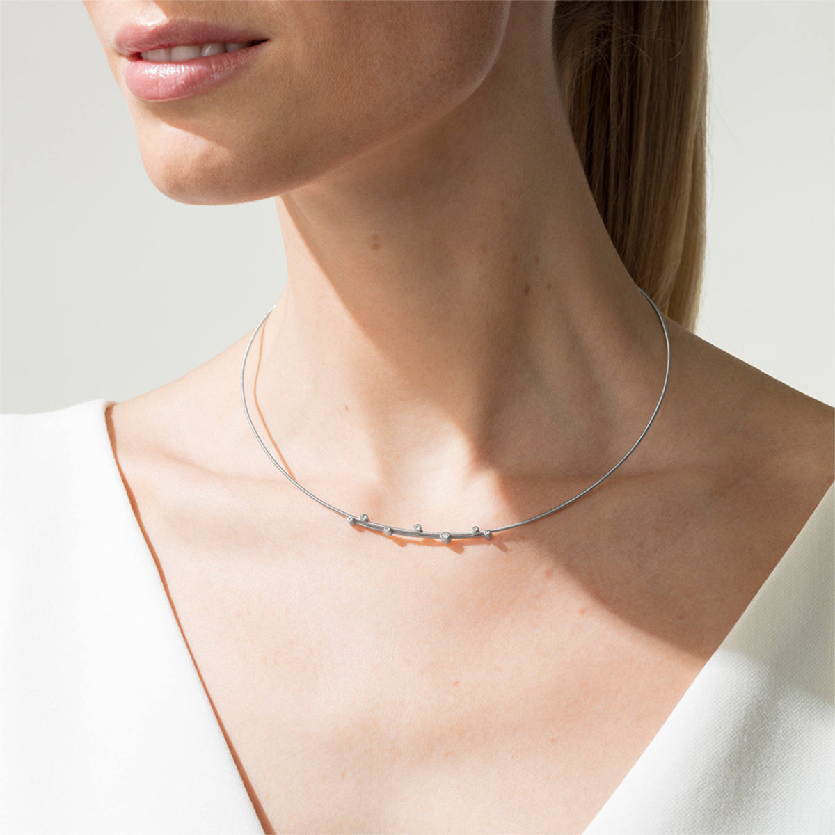 Niessing Artist Anhänger für 1,2 mm Schnur (N353907-43mm-7br-pt) aus Platin mit Diamant