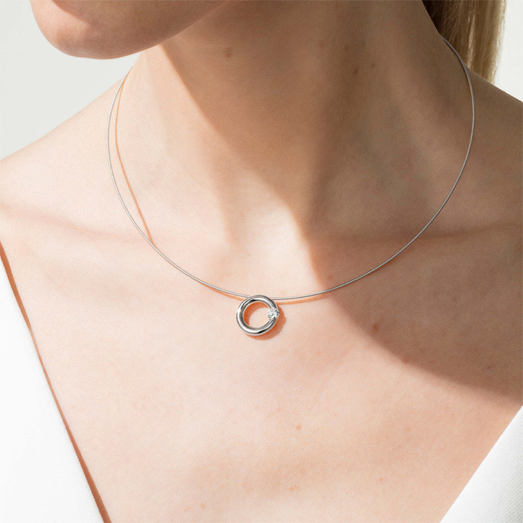 Niessing Spannring® Anhänger - N353924-15mm-0.25ct (25ct-gloss-pt) aus Platin mit Diamant